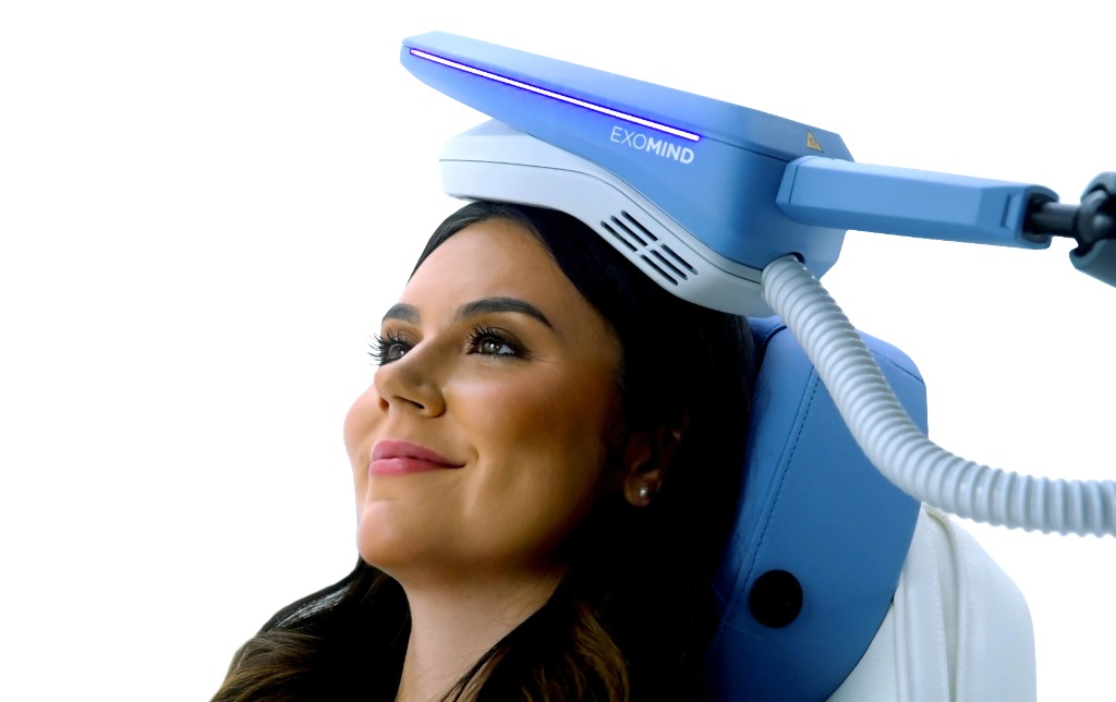 Patient receiving Exomind non-invasive neurostimulation therapy